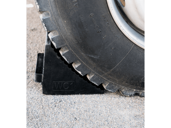 Heavy-duty Recycled Moulded RubberWheel Chock in use