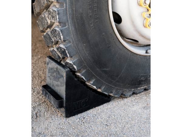 Heavy-duty Recycled Moulded RubberWheel Chock in use