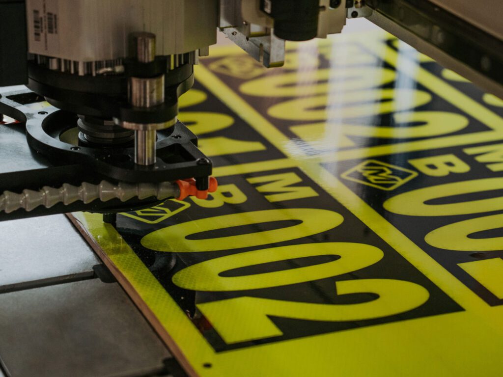 Cutting out the artwork on our CNC Router