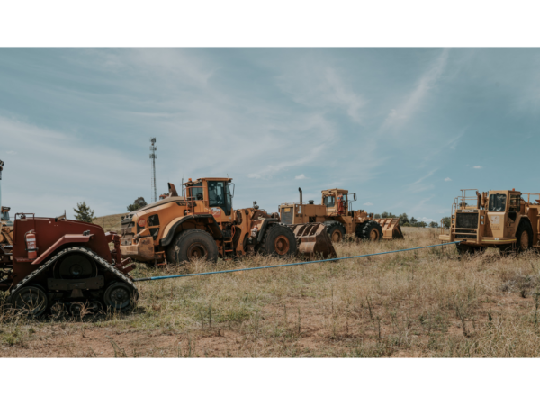 recovery strap pulling stuck tractor